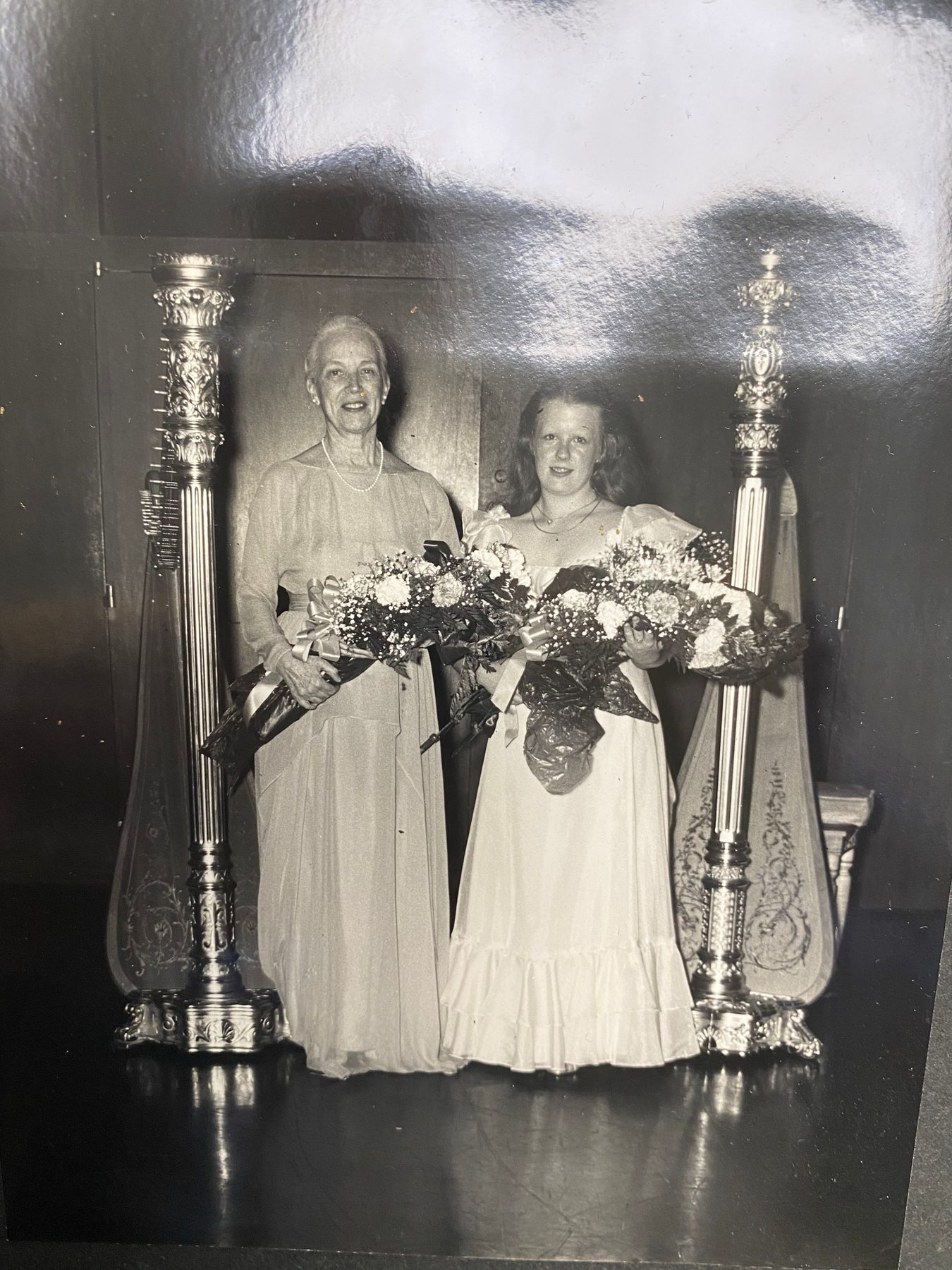 Young Guinndolyn with her harp instructor in Houston